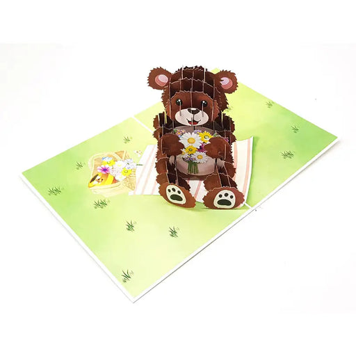 BEAR WITH BOUQUET POP-UP CARD ’BEAR WITH BOUQUET’ KIRIORI 10721 - Парти артикули<<<Декорации<<<Мебели и