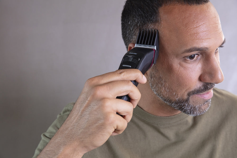 Beurer MN5X hair clipper, 7 Attachments, 6 adjustable cutting lengths and 4-stage fine adjustment, LED display with battery display, Battery and mains operation, travel lock display and charge display, storage bag