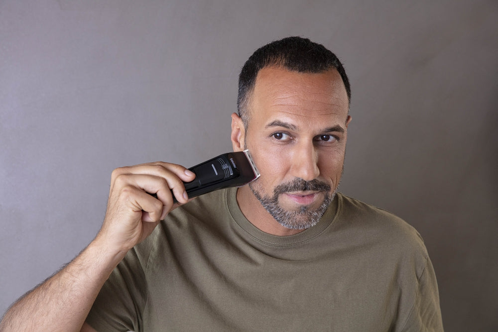 Beurer MN5X hair clipper, 7 Attachments, 6 adjustable cutting lengths and 4-stage fine adjustment, LED display with battery display, Battery and mains operation, travel lock display and charge display, storage bag
