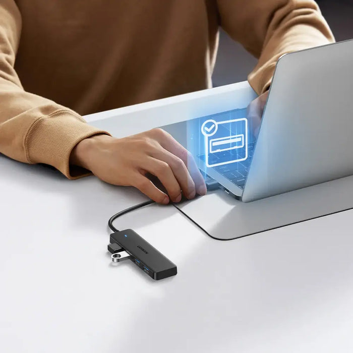 HUB Ugreen CM219 35574 with 4 USB-A 3.0 ports and USB-A 3.0 cable 1m - black - USB hubs<<<HurtelXML