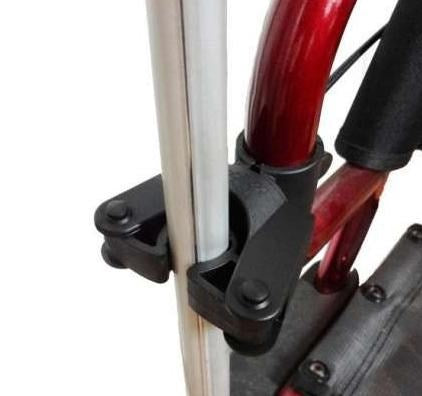 Holder for crutches wheelchair-mounted